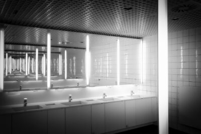 public restroom mirror and sinks need Houston janitorial services