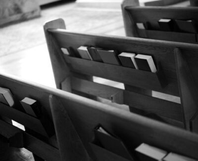 books sitting in church pews