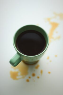 mug and spilled coffee needs Houston commercial cleaning